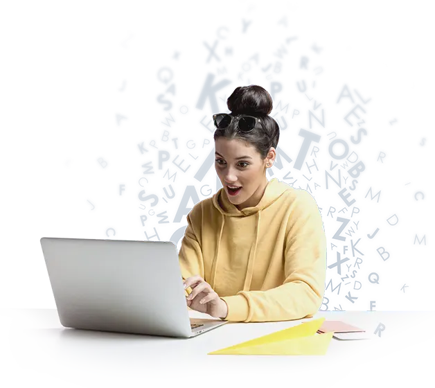 A professional woman enhancing her online presence at a desk with a laptop.